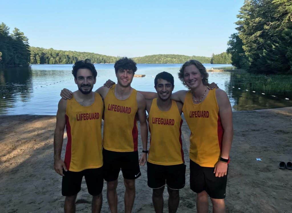 canada-camp-male-lifeguards-lake